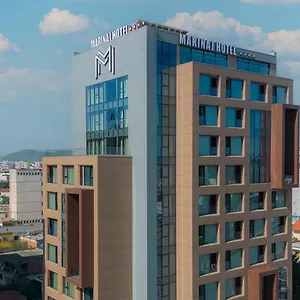 Marinaj & 4*, Tirana Albanië